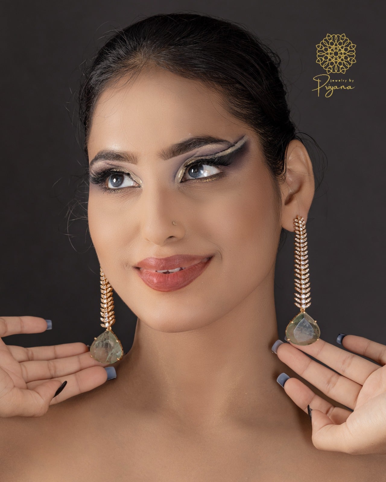 Tarishi Green Glow Dangler Earrings