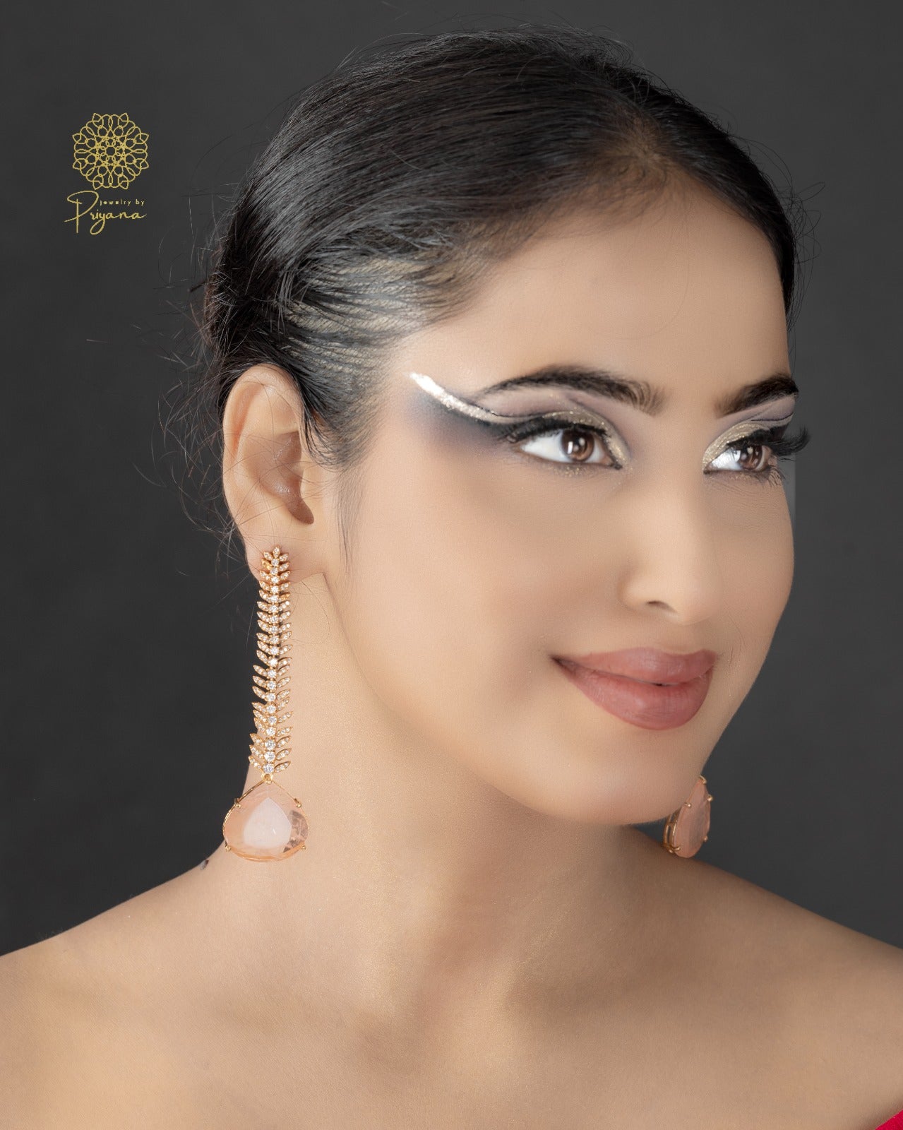 Tarishi Peach Glow Dangler Earrings