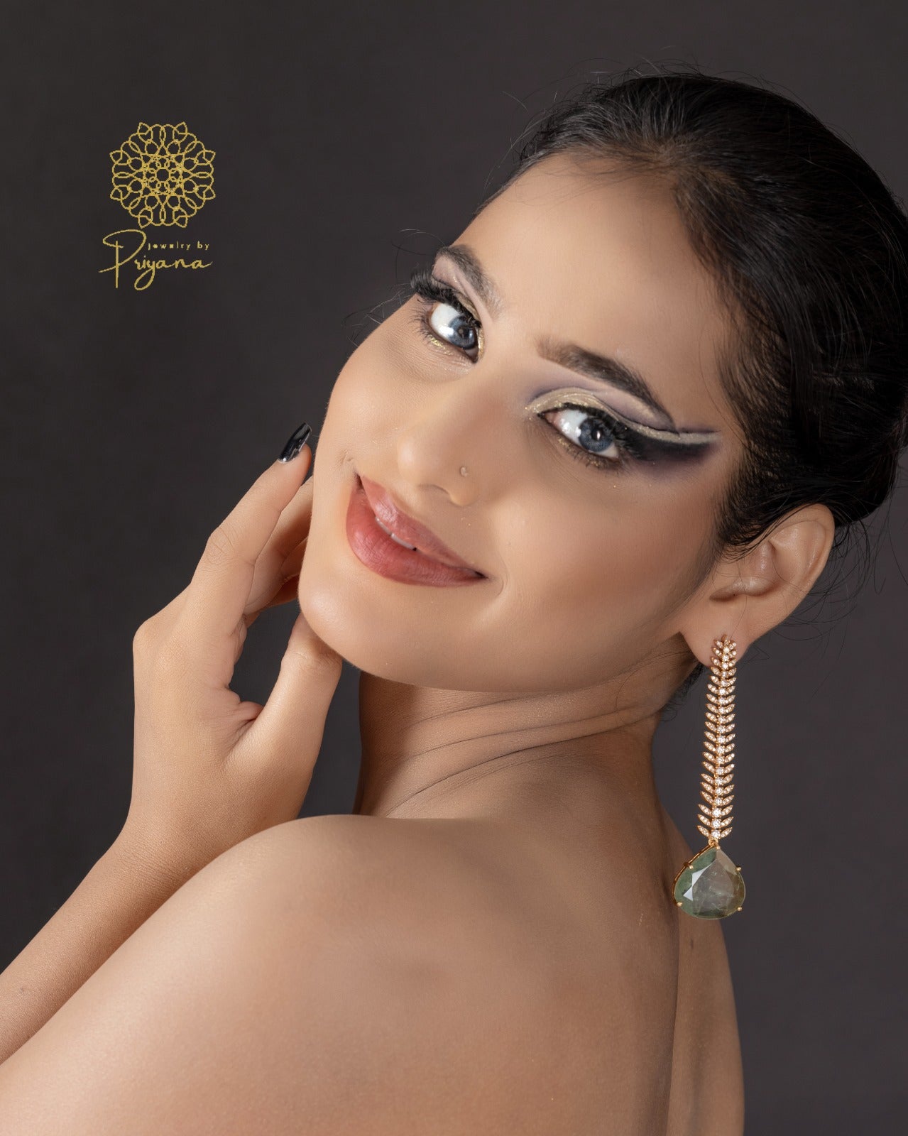 Tarishi Green Glow Dangler Earrings