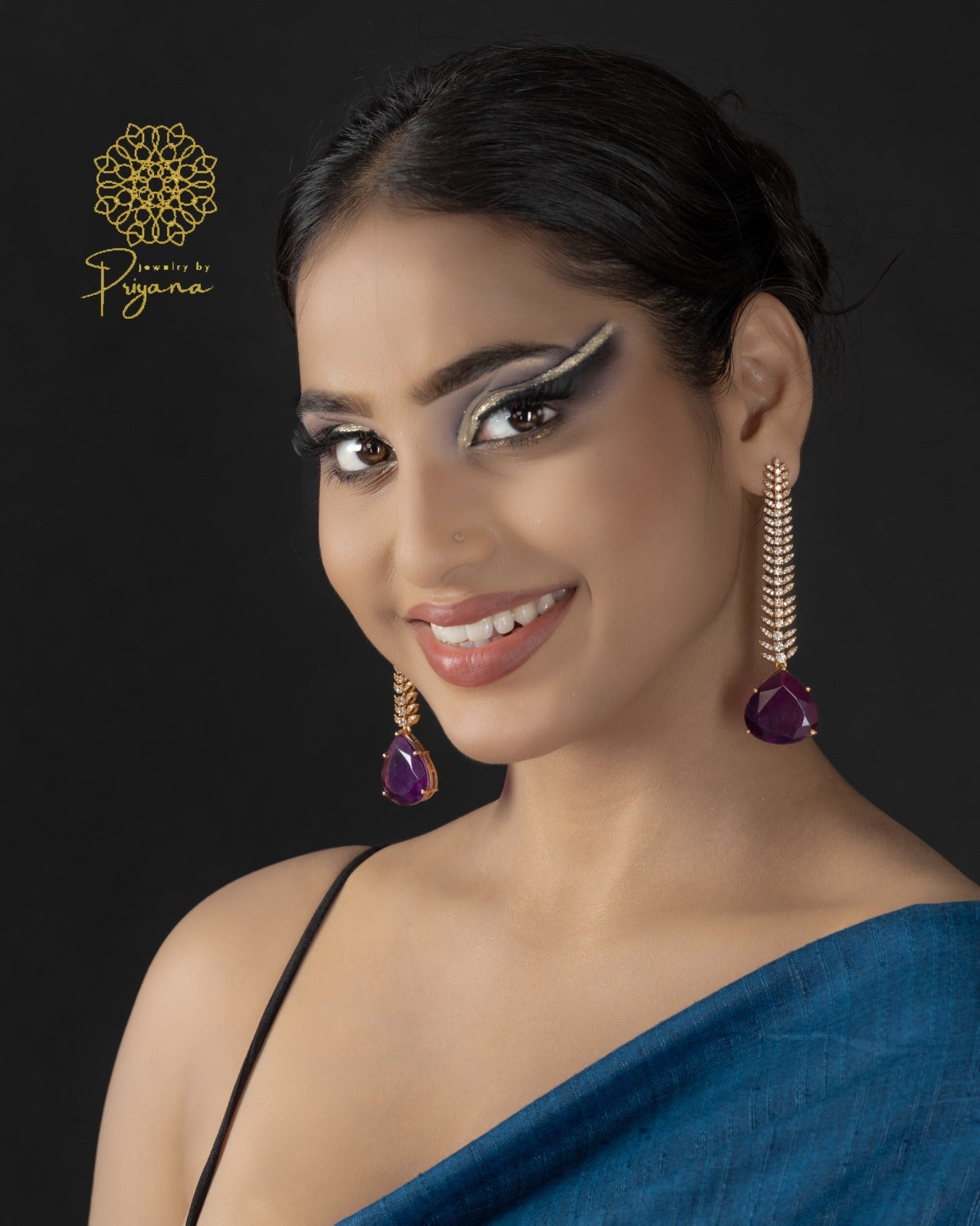 Tarishi Purple Glow Dangler Earrings